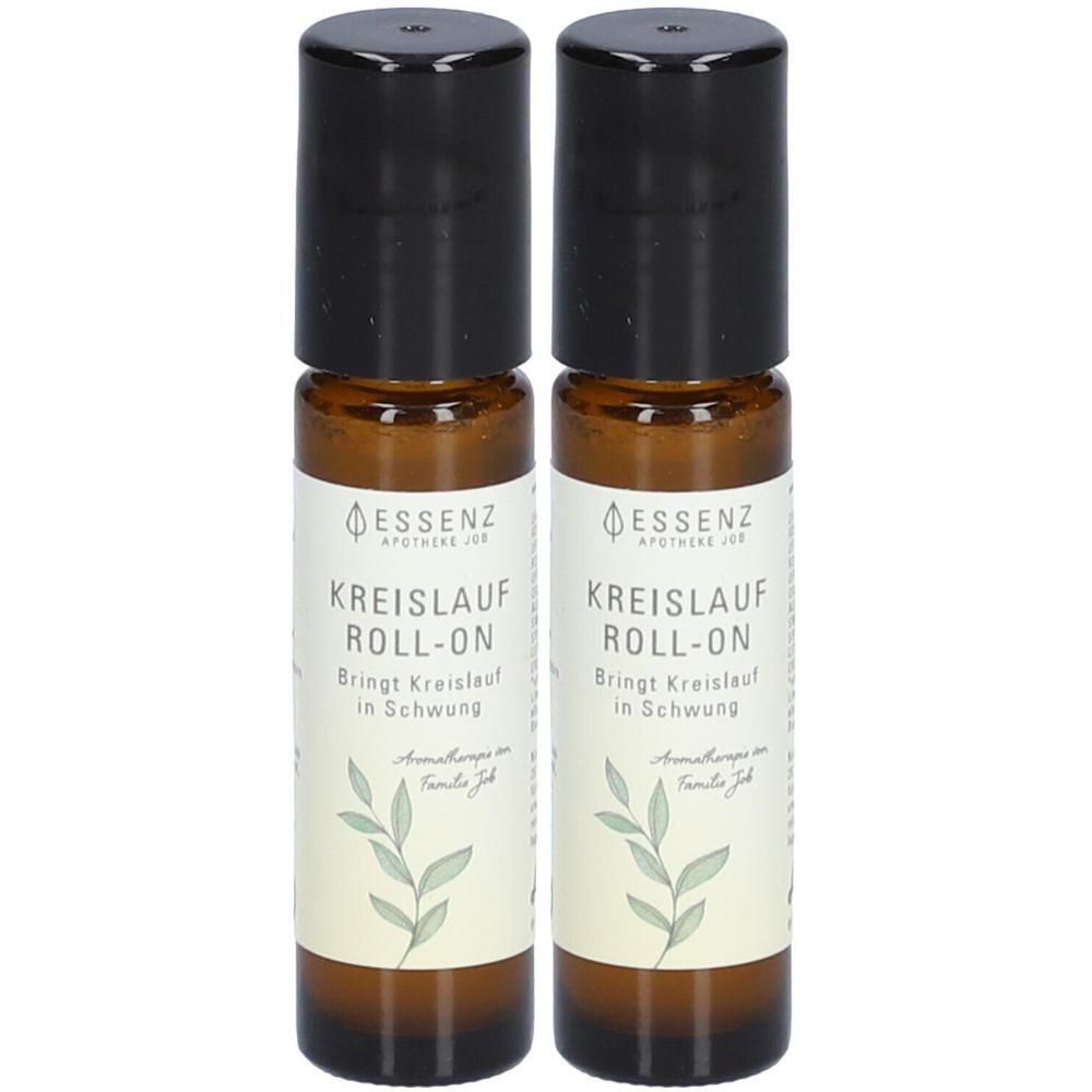Zwei ESSENZ Kreislauf Roll-Ons in braunen Glasflaschen mit schwarzen Verschlüssen und Etiketten.