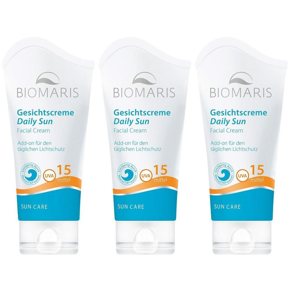 Drei Tuben BIOMARIS Gesichtscreme Daily Sun SPF 15. Weiße Tuben mit blauer und orangefarbener Beschriftung. Text: Gesichtscreme, Daily Sun, Facial Cream.