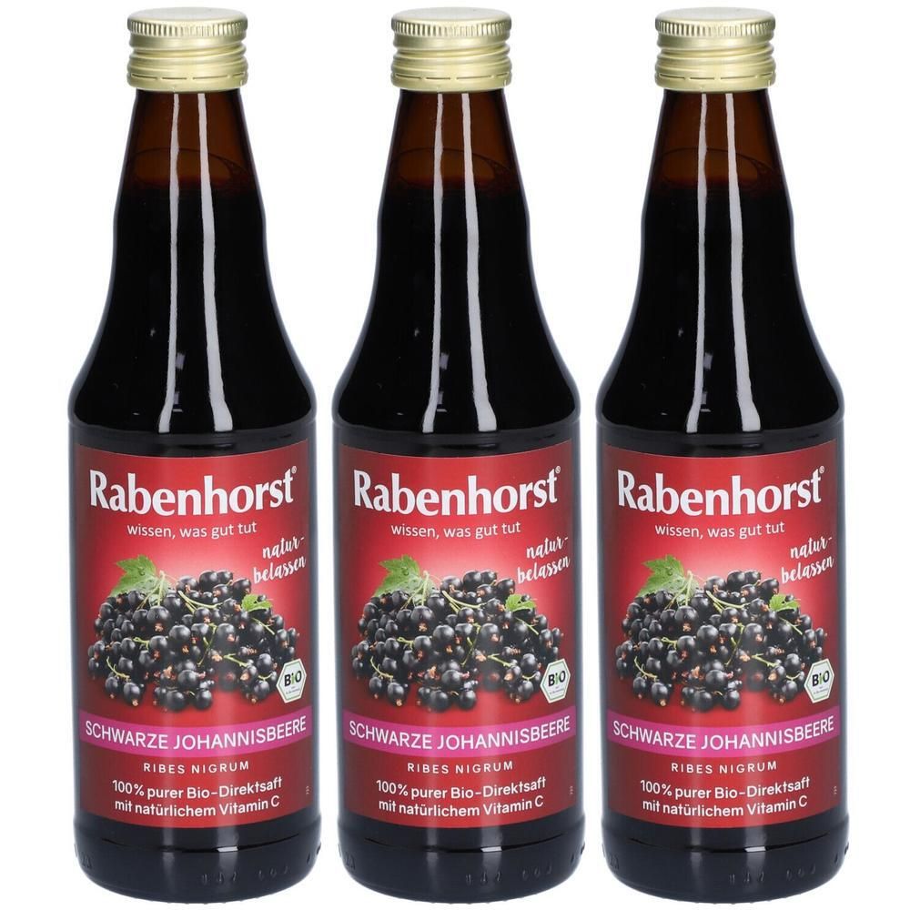 Drei Flaschen Rabenhorst Bio-Saft Schwarze Johannisbeere. Braune Glasflaschen mit goldenen Verschlüssen und roten Etiketten.