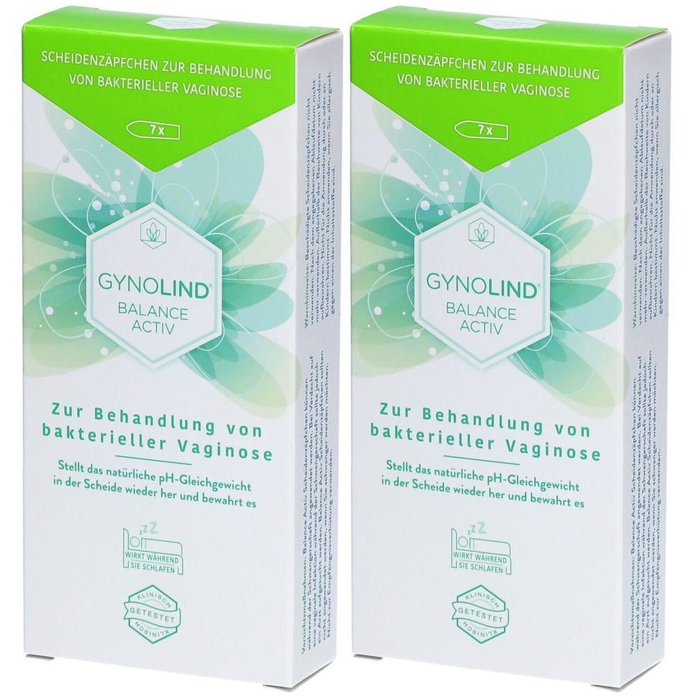 Zwei Schachteln Gynolind Balance Activ. Aufschrift: Scheidenzäpfchen zur Behandlung von bakterieller Vaginose. Grün-weiße Verpackung mit Logo und Produktnamen.