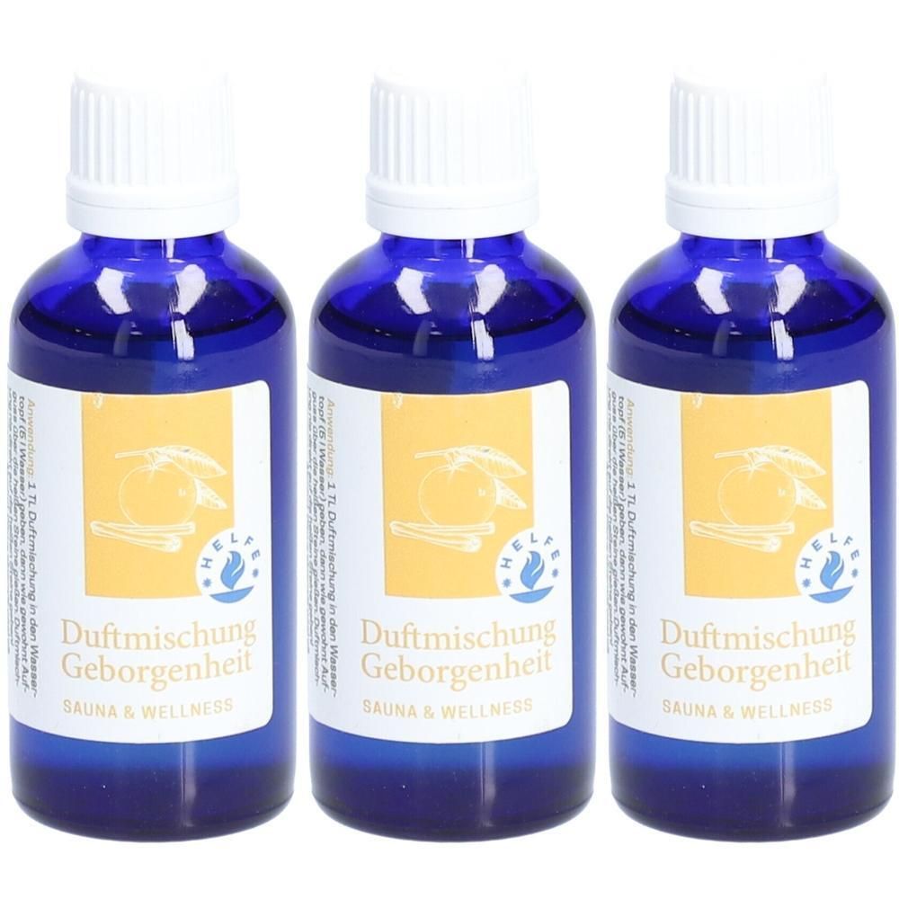 Drei blaue Glasflaschen mit weißen Verschlüssen. Etiketten mit Produktnamen und Logo. Aufschrift: Duftmischung Geborgenheit, Sauna & Wellness.