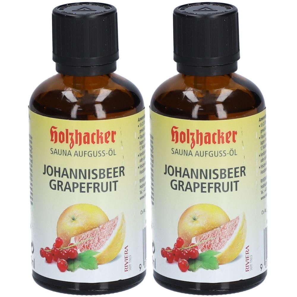 Zwei braune Glasflaschen mit schwarzem Deckel. Aufschrift: Holzhacker SAUNA AUFGUSS-ÖL JOHANNISBEER GRAPEFRUIT. Abbildung von Johannisbeeren und Grapefruit.