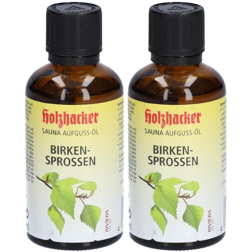 Zwei braune Glasflaschen mit schwarzem Deckel. Auf dem Etikett steht "Holzhacker SAUNA AUFGUSS-ÖL BIRKEN-SPROSSEN".