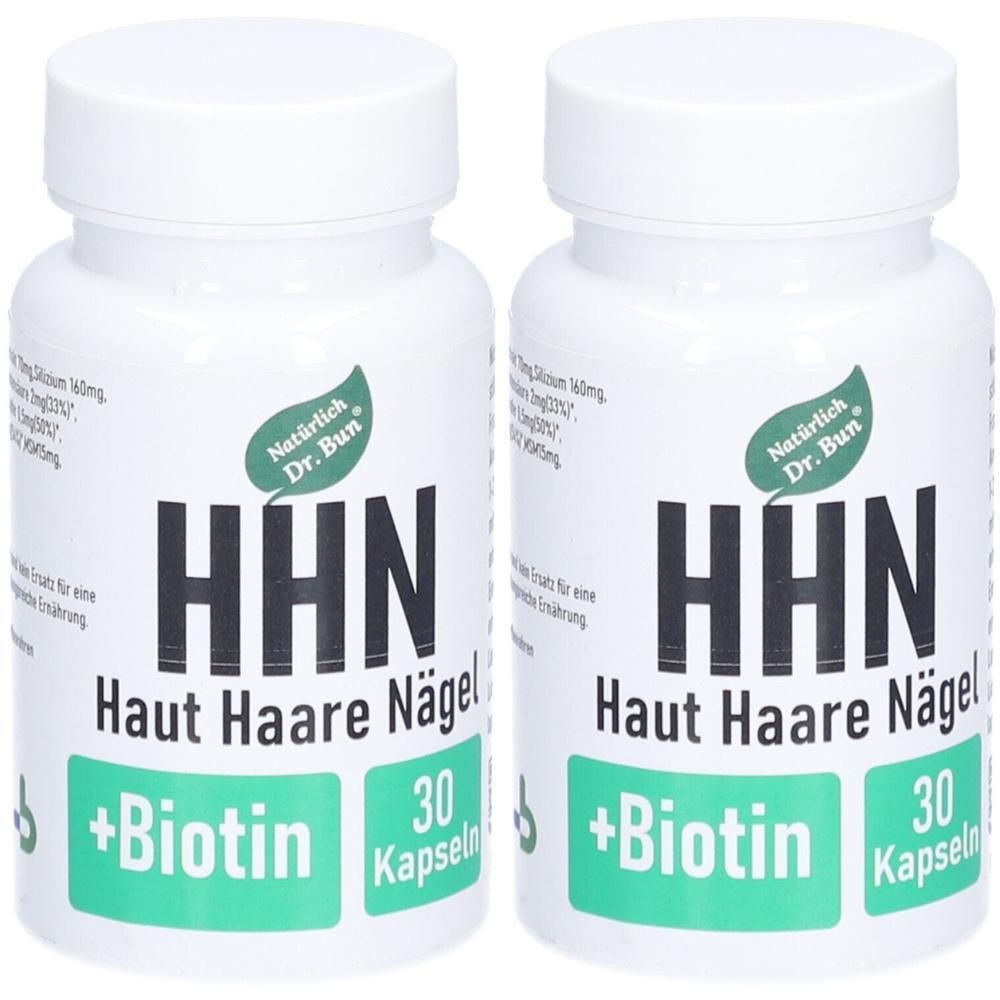 Zwei weiße Flaschen mit Kapseln. Aufschrift: HHN Haut Haare Nägel +Biotin. 30 Kapseln. Marke: Dr. Bun.