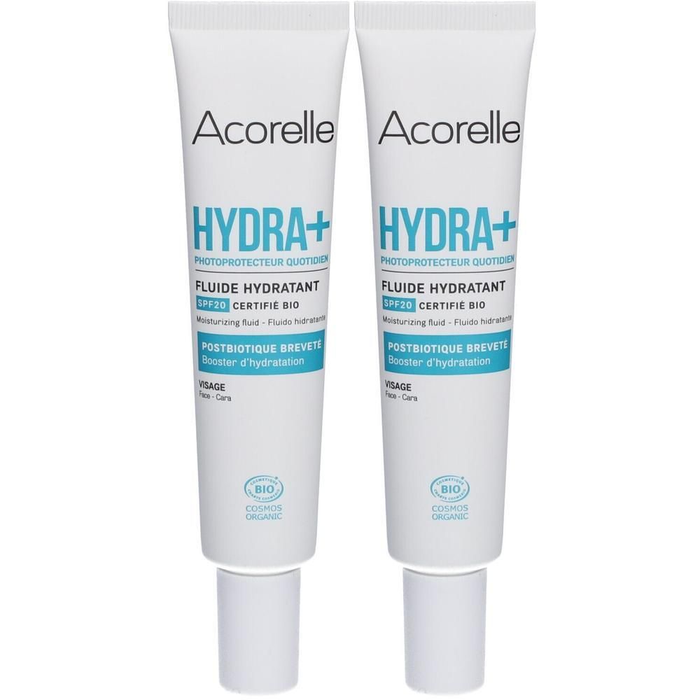 Zwei Tuben Acorelle Hydra+ Feuchtigkeitsfluid SPF20. Weiße Tuben mit blauer und schwarzer Schrift. Aufschrift: Fluide Hydratant, SPF20, Certifié Bio.