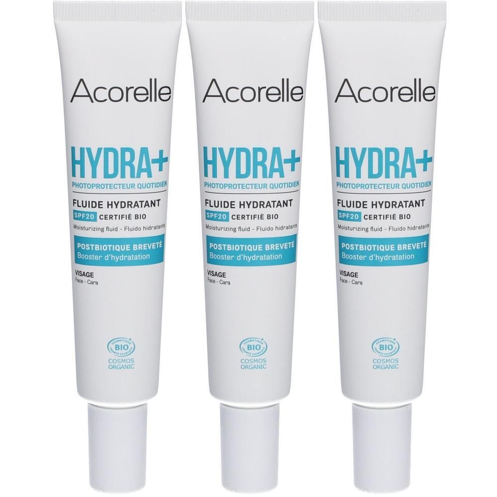 Drei Tuben Acorelle Hydra+ Feuchtigkeitsfluid SPF20. Weiße Tuben mit blauer Schrift und weißem Verschluss. Bio-Zertifizierung.