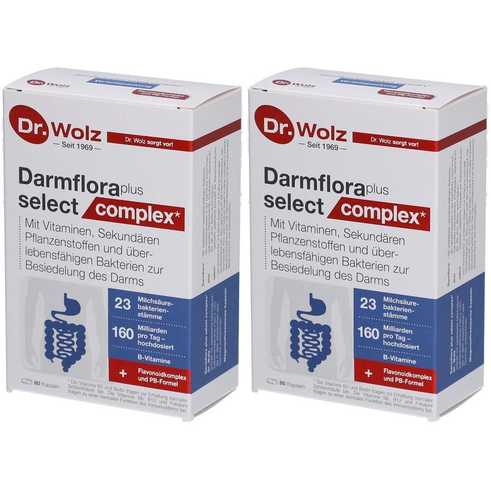 Zwei Kartons mit der Aufschrift "Dr. Wolz Darmflora select complex*". Weiße Verpackung mit roter und blauer Schrift.