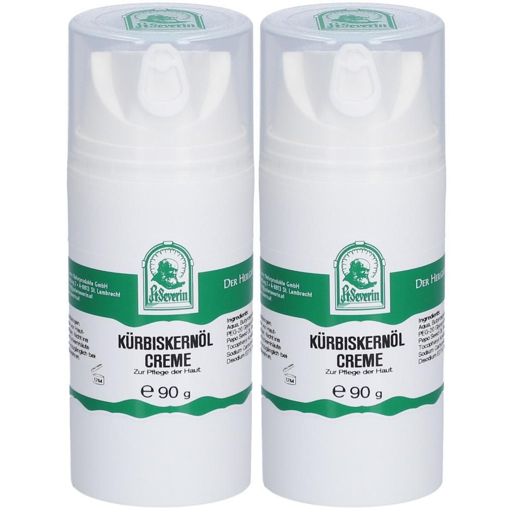Zwei weiße Cremes mit grünem Etikett. Aufschrift: Kürbiskernöl Creme, e 90 g. Mit durchsichtigem Deckel.