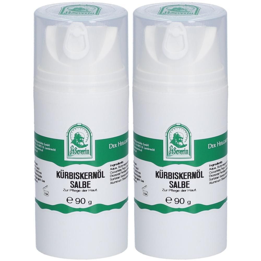 Zwei weiße Cremetuben mit transparenten Deckeln. Aufschrift: Kürbiskernöl Salbe, St. Severin Logo, e 90 g. Grüne und weiße Etiketten.