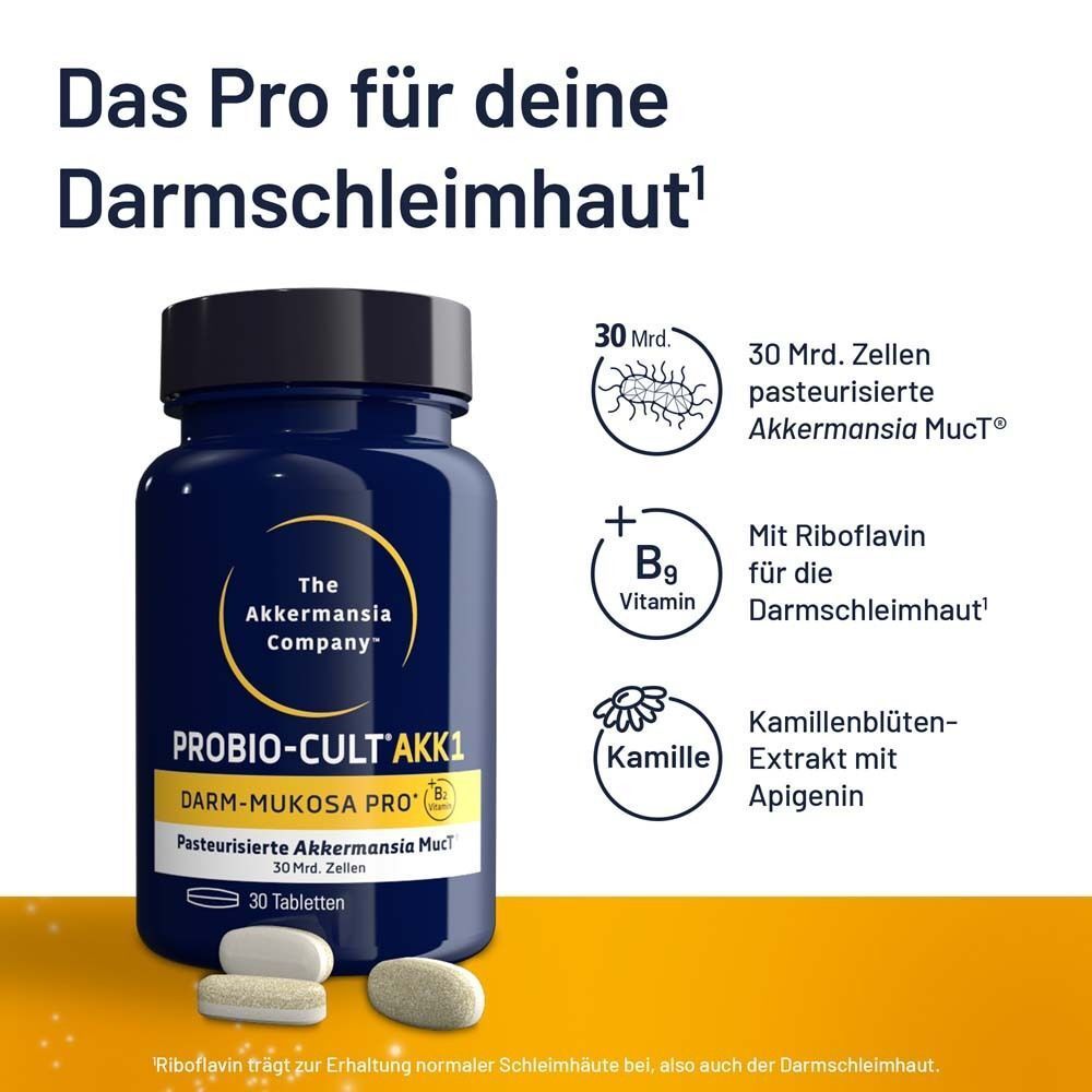 Dunkelblaue Flasche PROBIO-CULT AKK1 mit Tabletten daneben. Enthält Riboflavin, Vitamin B9 und Kamille.