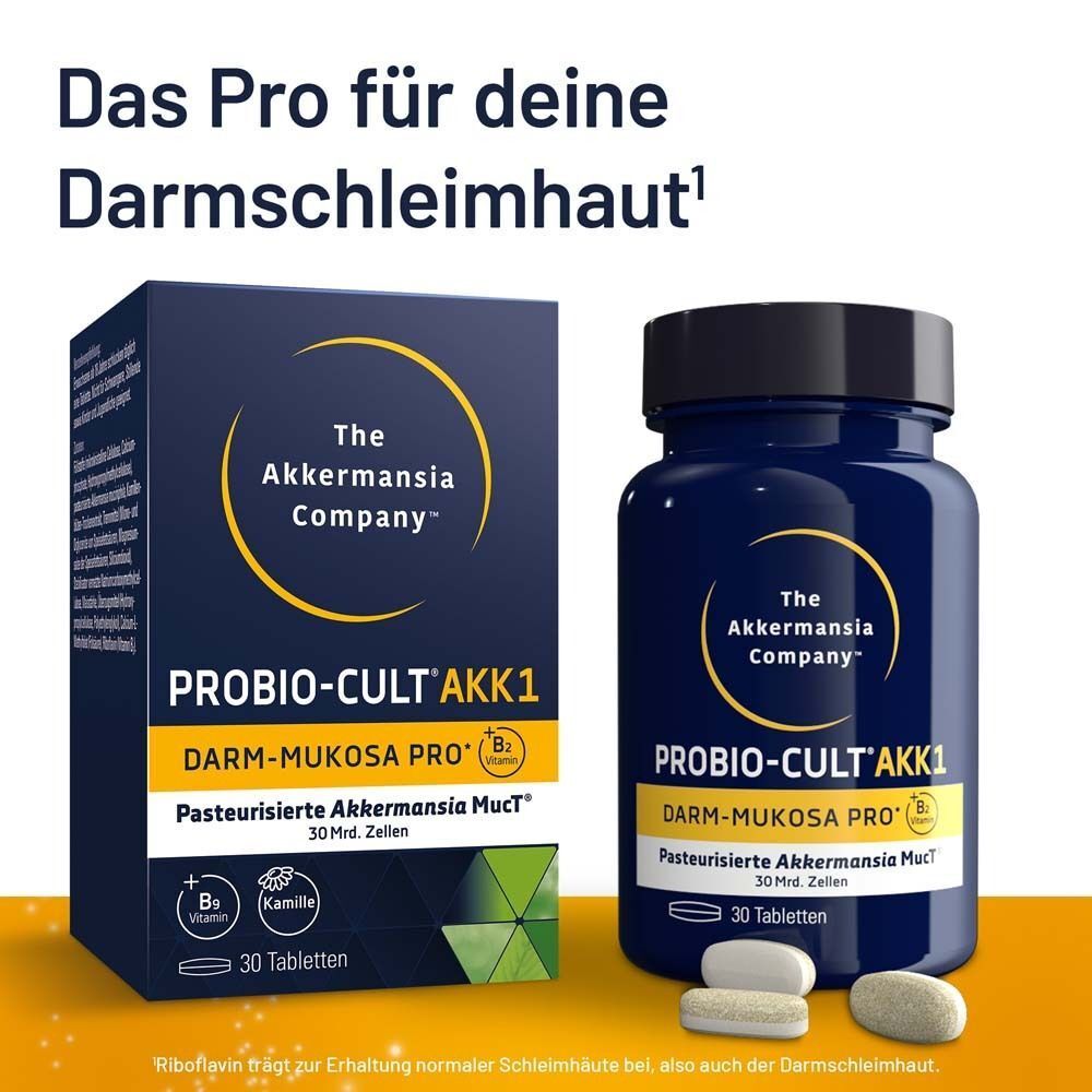 Dunkelblaue Flasche PROBIO-CULT AKK1 mit Tabletten daneben. Enthält Riboflavin, Vitamin B9 und Kamille. 30 Tabletten.