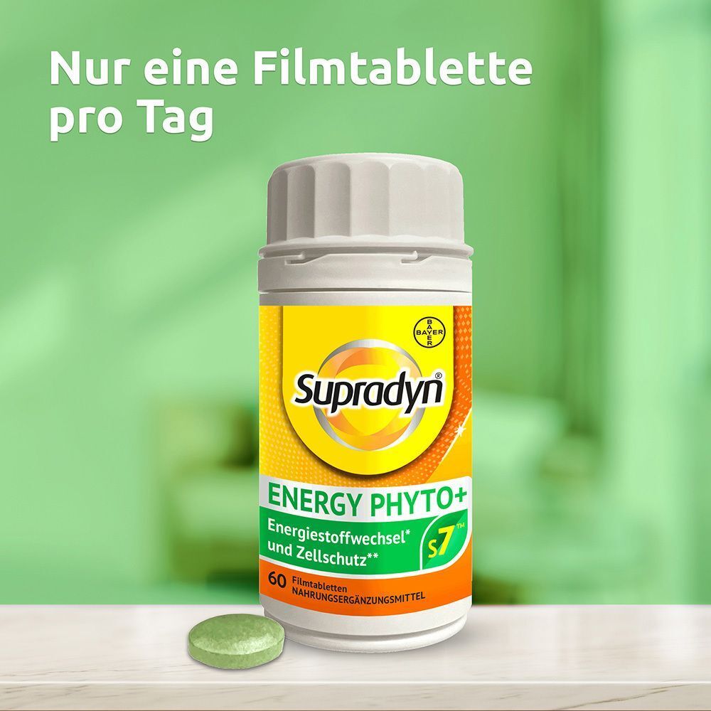 Eine Flasche Supradyn Energy Phyto+ Filmtabletten und eine grüne Tablette. Gelbe Verpackung.