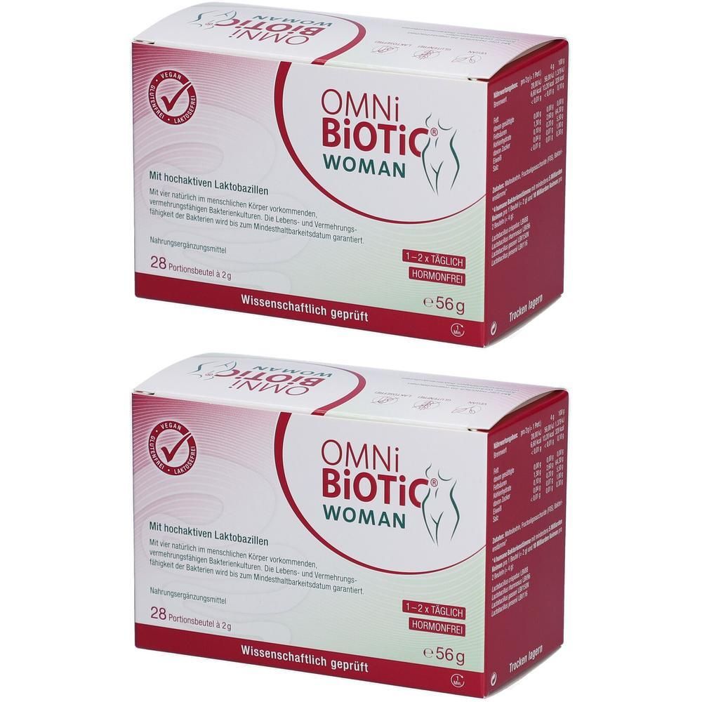 Zwei Packungen OMNi-BiOTiC® WOMAN. Weiße Schachteln mit roter Seite, Logo und Text. 28 Portionen, wissenschaftlich geprüft, hormonfrei.