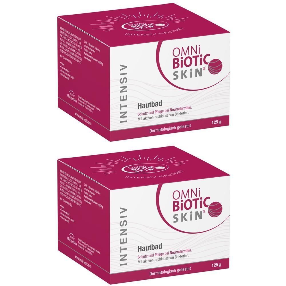 Zwei rechteckige Kartons mit der Aufschrift OMNi-BiOTiC SKIN Intensiv Hautbad. Der Karton ist rot-weiß und trägt das Logo.