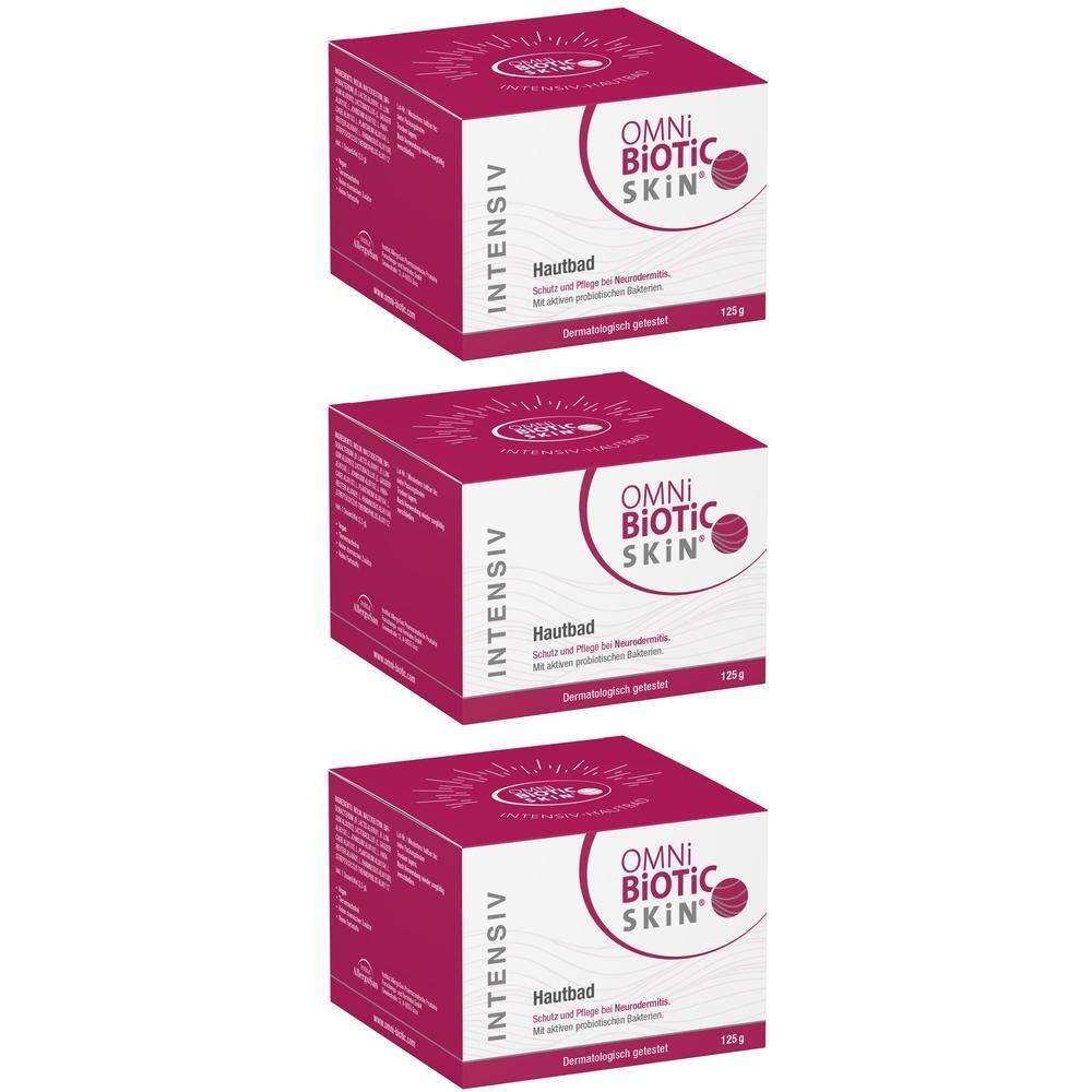 Drei quadratische, rosafarbene Produktverpackungen mit weißer Schrift. OMNi-BiOTiC SKIN® Intensiv Hautbad ist auf der Vorderseite sichtbar.