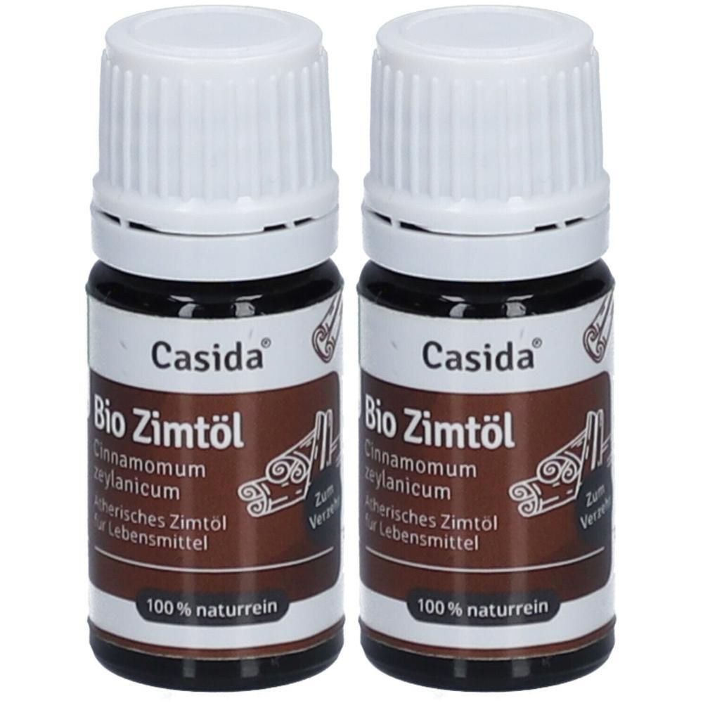 Zwei braune Glasflaschen mit weißem Deckel. Aufschrift: Casida Bio Zimtöl, 100% naturrein. Für Lebensmittel.