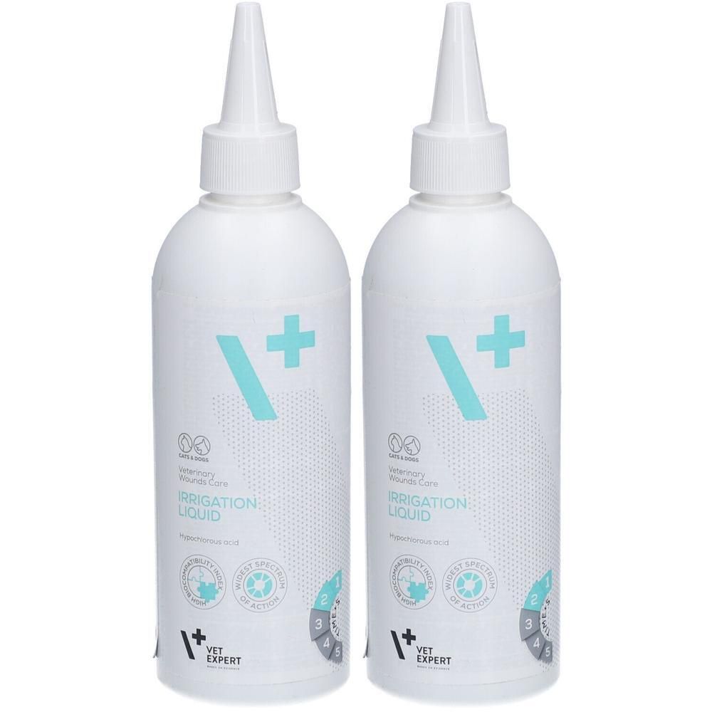Zwei weiße Flaschen mit spitzem Ausgießer. Aufschrift: Irrigation Liquid, VET EXPERT. Türkisfarbenes Logo mit Kreuz.