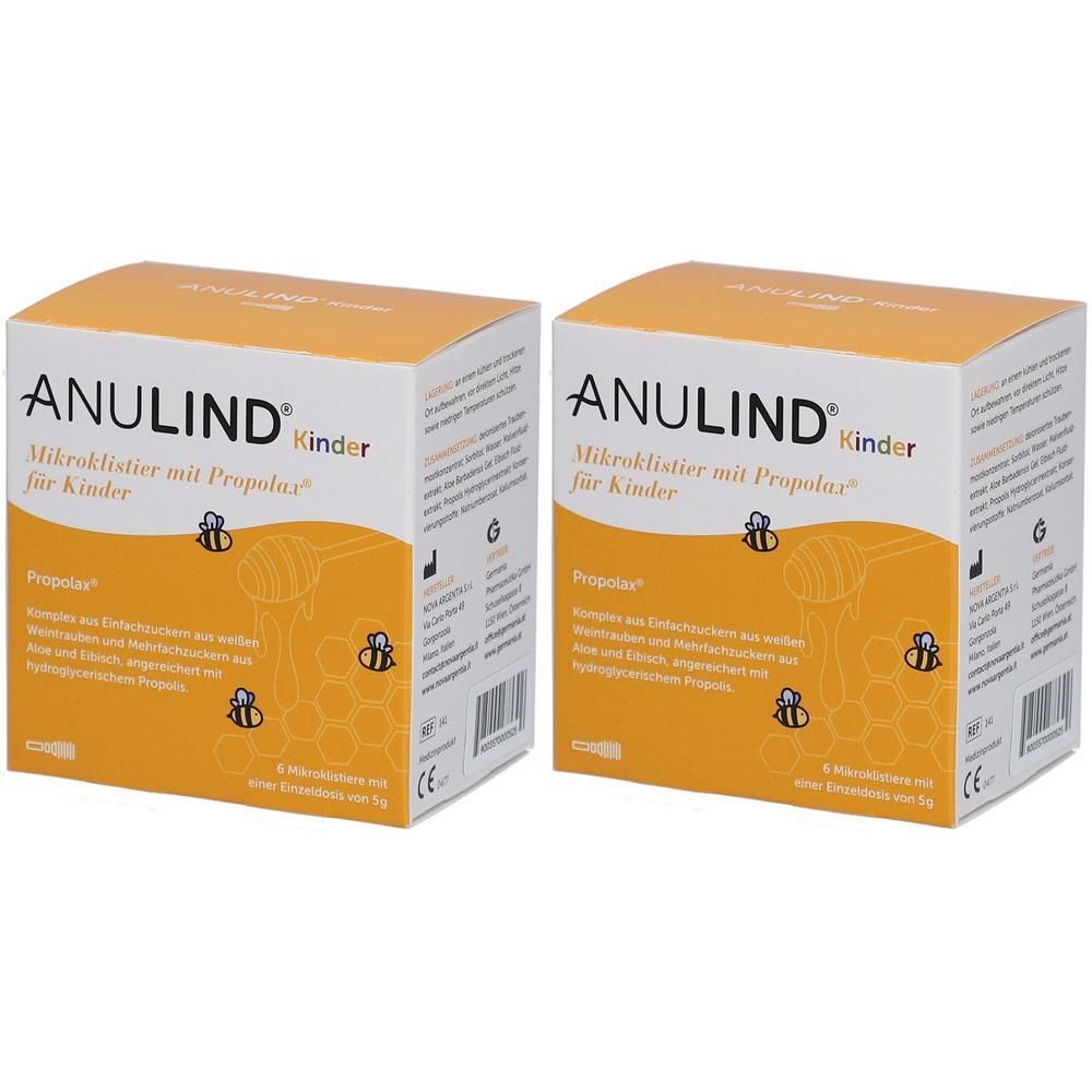 Zwei Kartons ANULIND Kinder Mikroklistier. Weiße Schrift auf gelbem Grund. Produktname und Beschreibung. Abbildung von Bienen und Honigwabe.