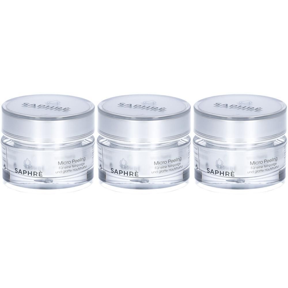 Drei Gläser SAPHRÈ Micro Peeling mit silbernen Deckeln. Klare Behälter zeigen weiße Creme.