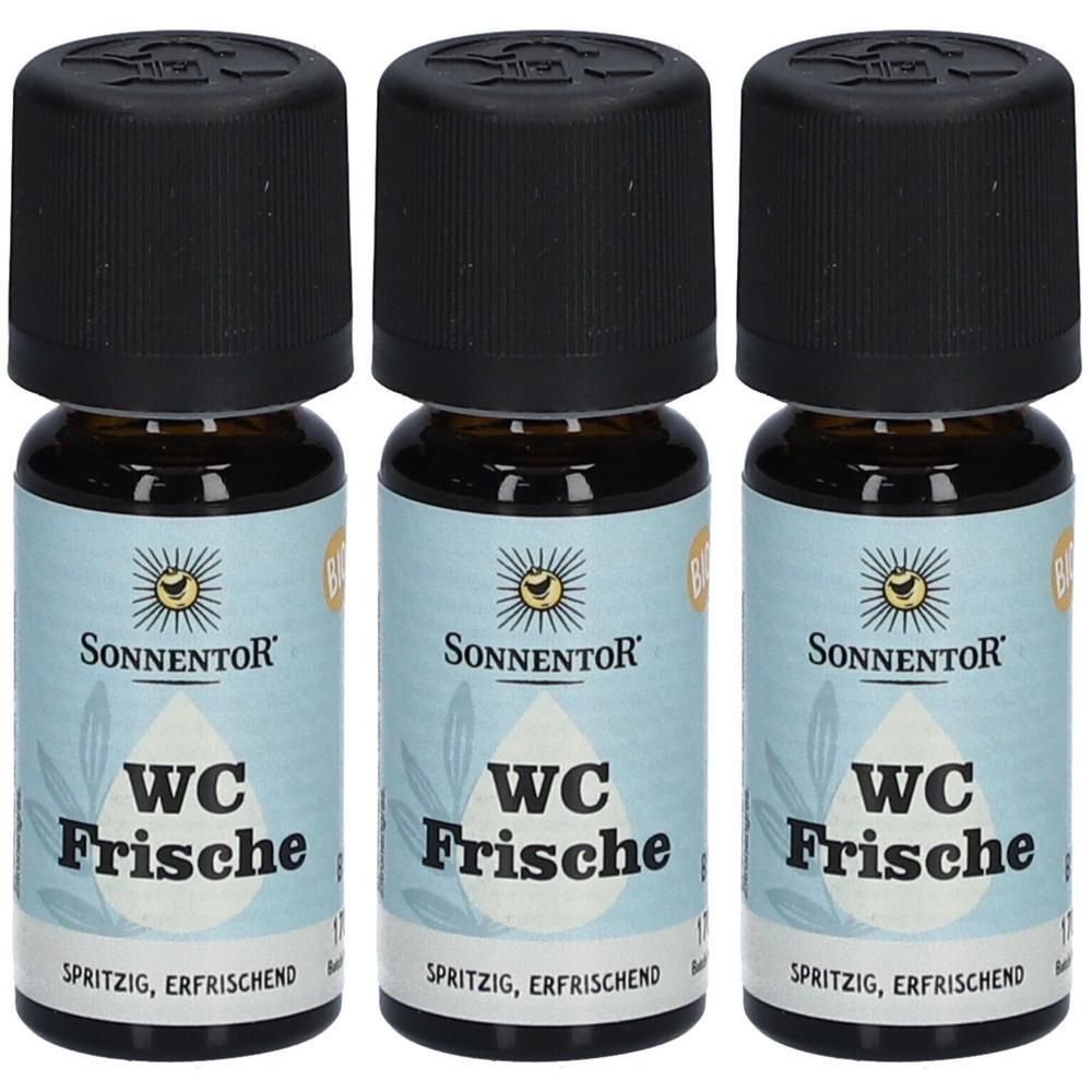 Drei braune Glasflaschen mit schwarzen Deckeln. Auf den Etiketten steht "WC Frische" und "SONNENTOR".