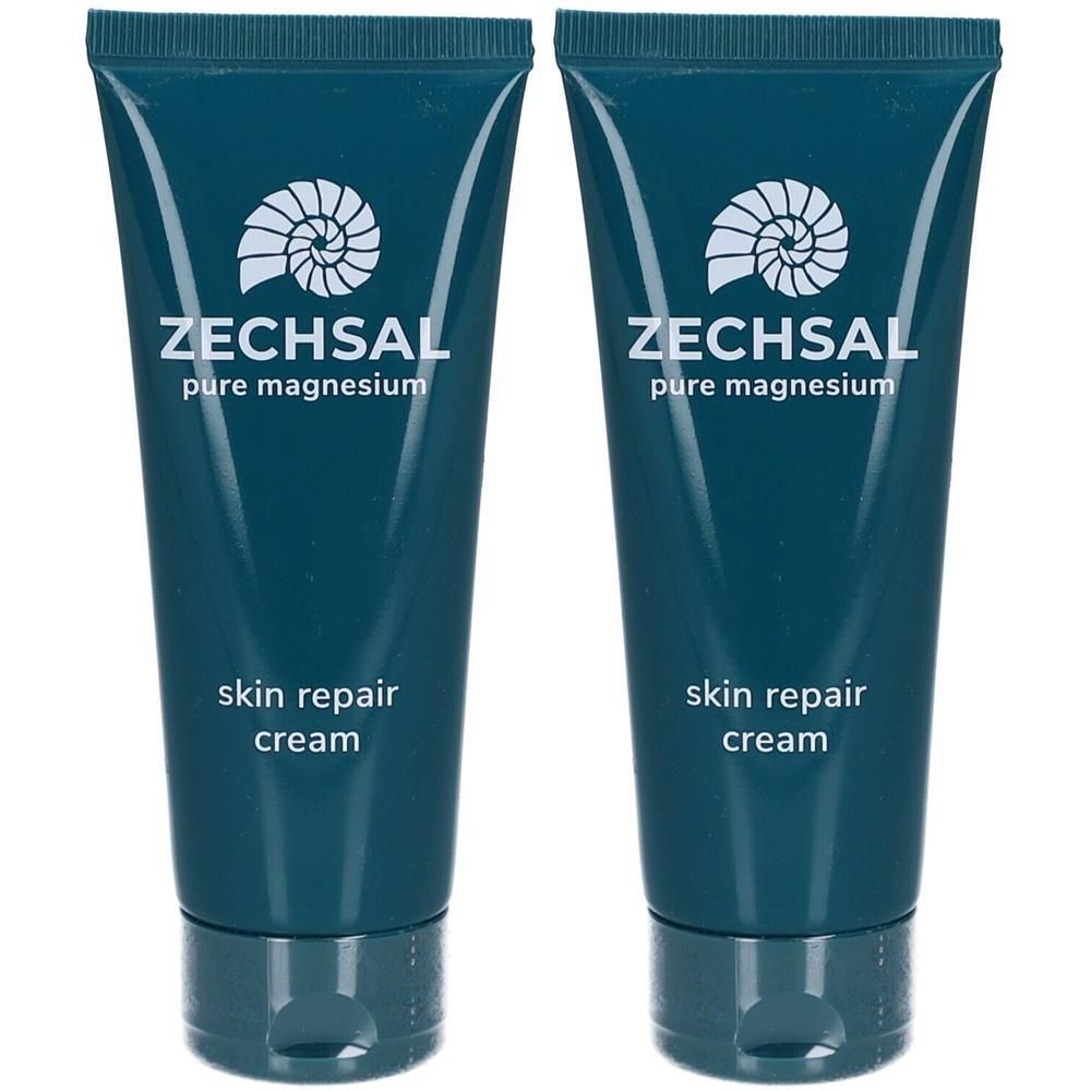 Zwei Tuben Hautcreme. Dunkelblaue Tuben mit weißem Logo und Schriftzug Zechsal, pure magnesium, skin repair cream.