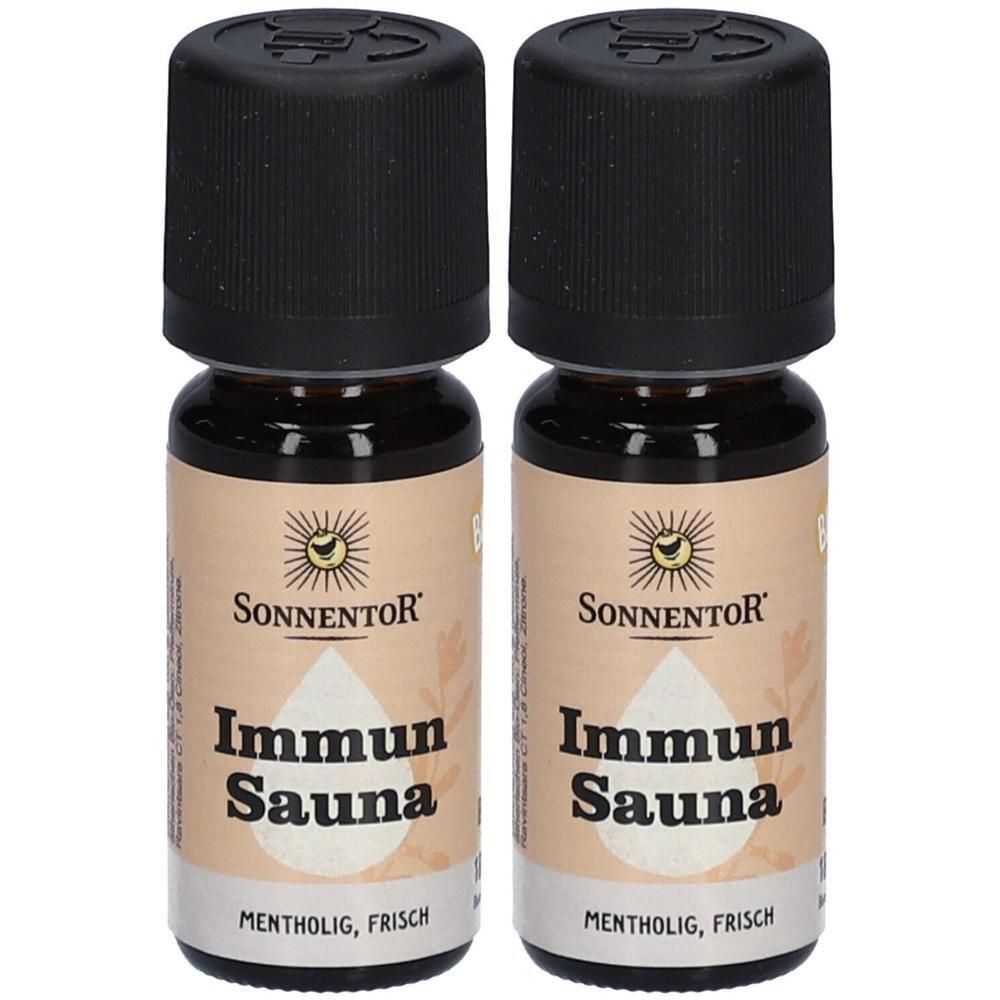 Zwei kleine Glasflaschen mit schwarzem Deckel. Aufschrift: Sonnentor, Immun Sauna, Mentholig, Frisch. Beige Etikett mit Sonnenlogo.