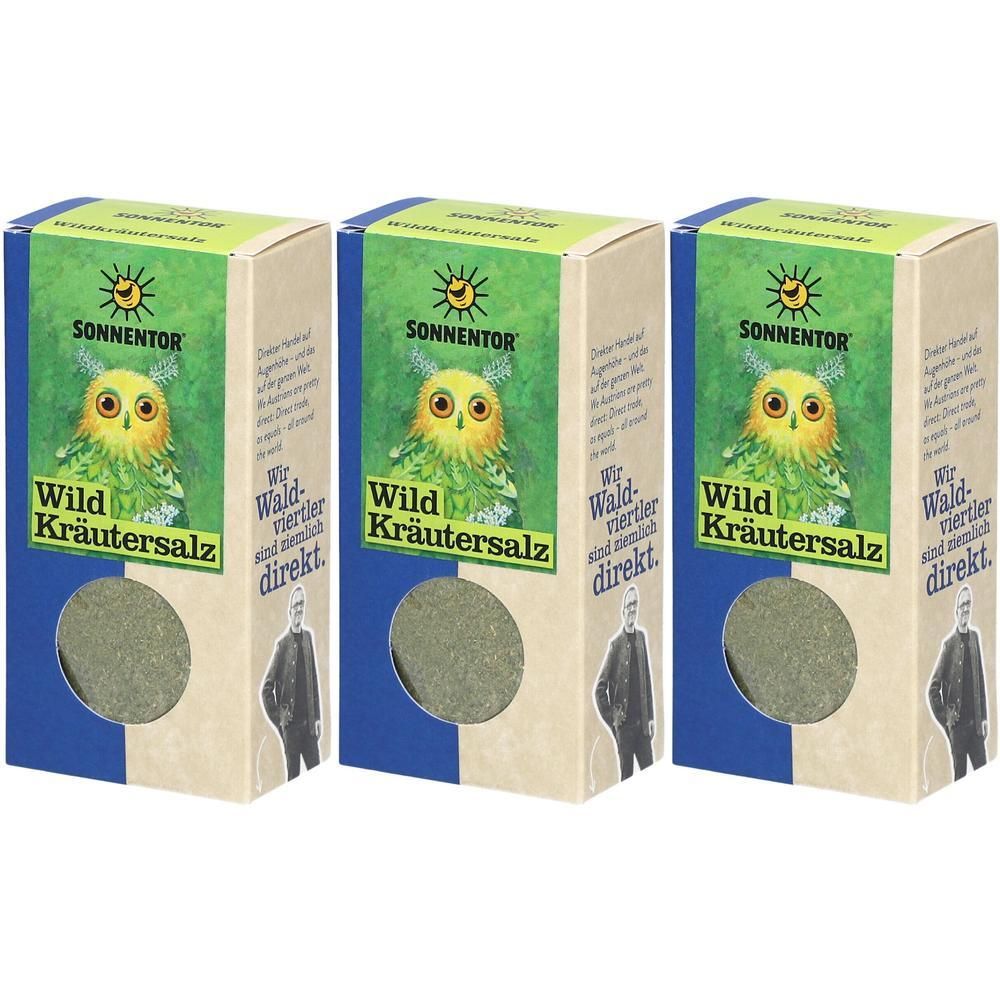 Drei Kartons SONNENTOR BIO Wildkräutersalz. Jeder Karton zeigt ein Eulen-Design und Produktnamen. Runde Öffnung zeigt das Salz.