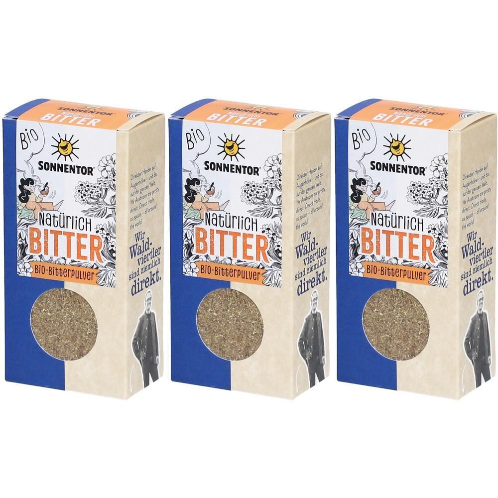 Drei rechteckige Kartonverpackungen. Aufschrift "Bio Bitter" und "Sonnentor". Sichtfenster mit braunem Pulver. Illustrationen und Text.