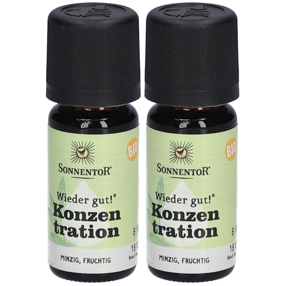 Zwei Fläschchen Sonnentor Konzentration ätherisches Öl. Bio-Siegel und Produktinformationen auf dem Etikett.