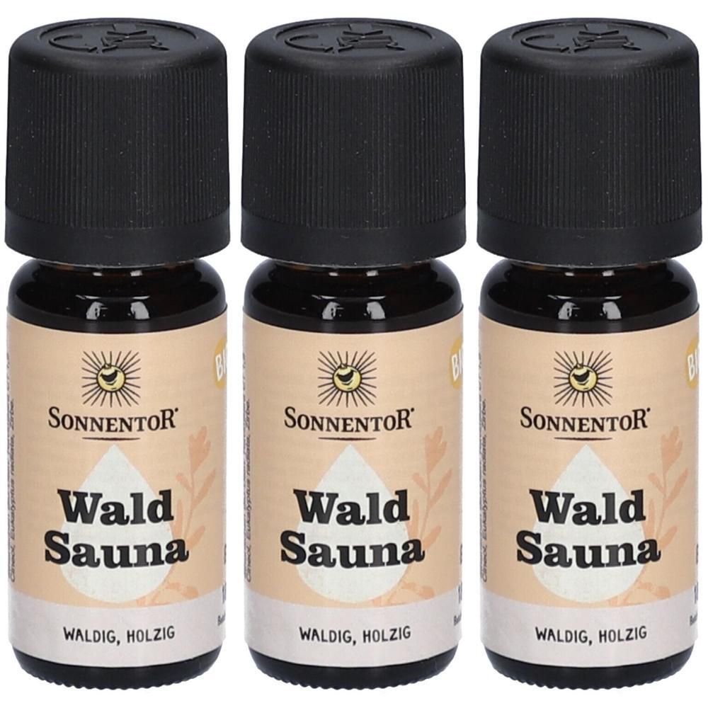 Drei Fläschchen Sonnentor Wald Sauna ätherisches Öl bio. Dunkelbraune Glasflaschen mit schwarzem Schraubverschluss.