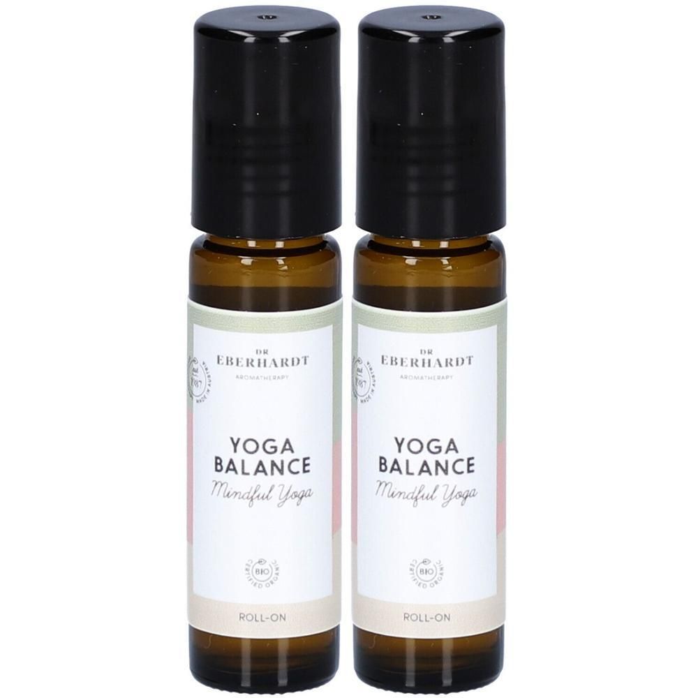 Zwei Dr. Eberhardt Yoga Balance Roll-ons mit schwarzen Kappen und Etiketten, die "Yoga Balance" und "Mindful Yoga" zeigen.