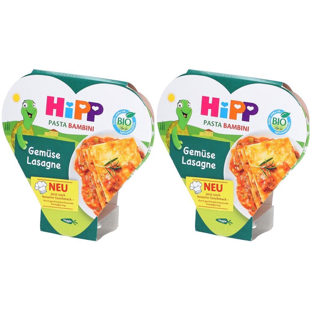 Zwei Packungen HiPP Gemüse Lasagne für Babys. Bio-Siegel und Schildkröten-Maskottchen auf der Verpackung.