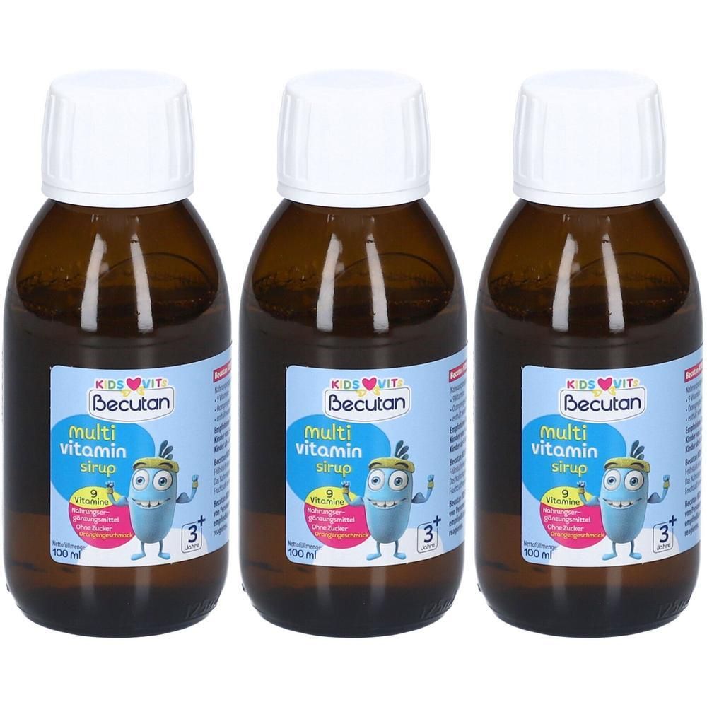 Drei Flaschen Becutan Kids Vit Multi Vitamin Sirup mit weißen Verschlüssen. Braune Glasflaschen mit blauen Etiketten, die einen Cartoon zeigen.