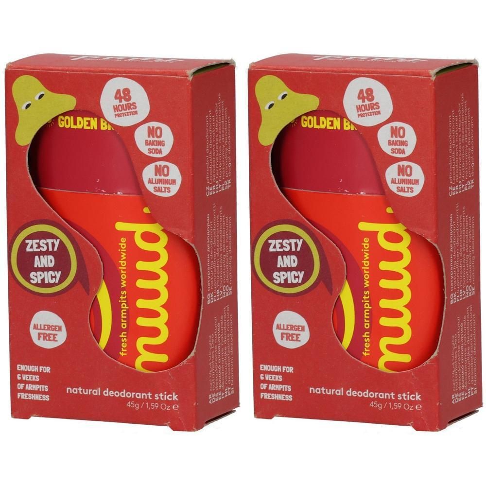 Zwei NUUD natürliche Deodorantsticks in "Golden Breeze"-Verpackung. "Zesty and Spicy"-Duft, 48h Schutz, ohne Backpulver oder Aluminiumsalze.