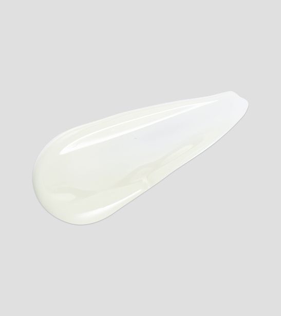 Ein Tropfen durchscheinendes Gel auf grauem Hintergrund.