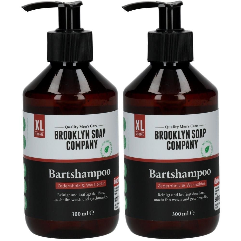 Zwei Flaschen Bartshampoo von Brooklyn Soap Company, je 300 ml, mit Pumpverschluss. Braune Kunststoffflaschen mit schwarzen Etiketten.