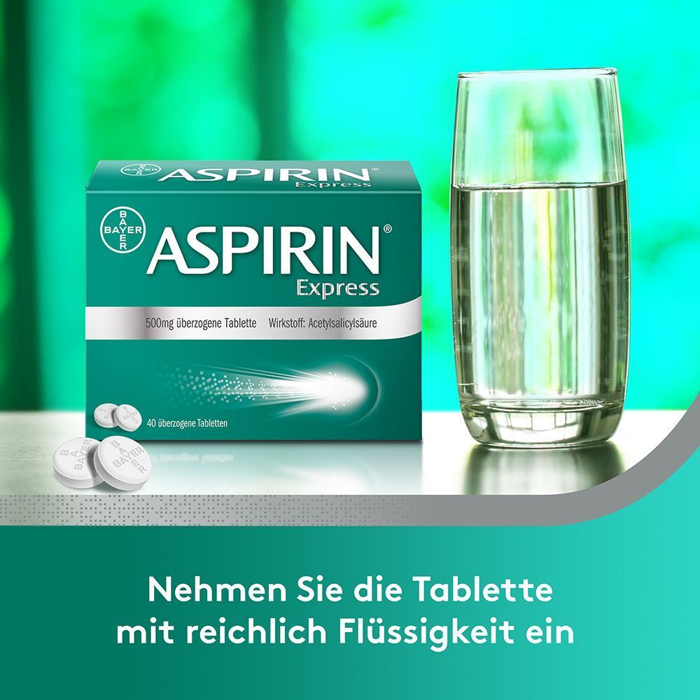 Aspirin® Express Packung neben einem Glas Wasser.