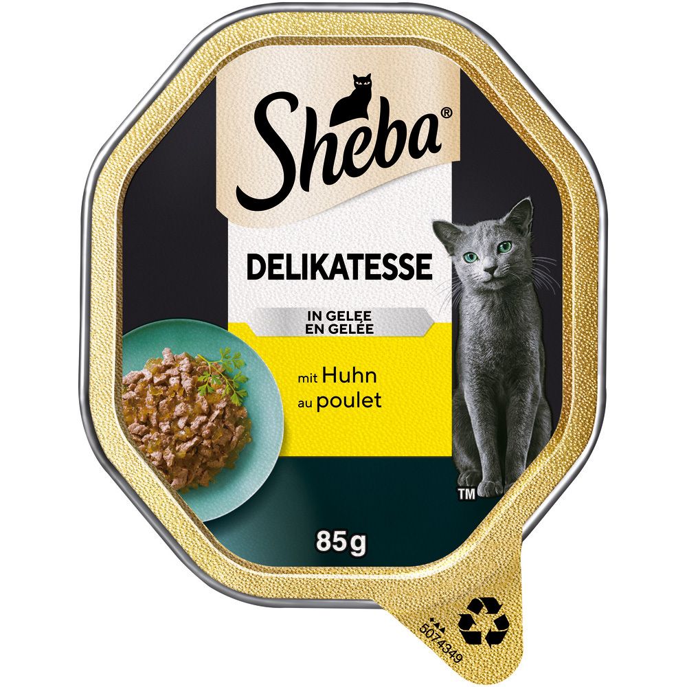 Sheba Schale Delikatessen in Gelee mit Huhn, 85g. Enthält ein Bild einer Katze und eine Portion Futter.