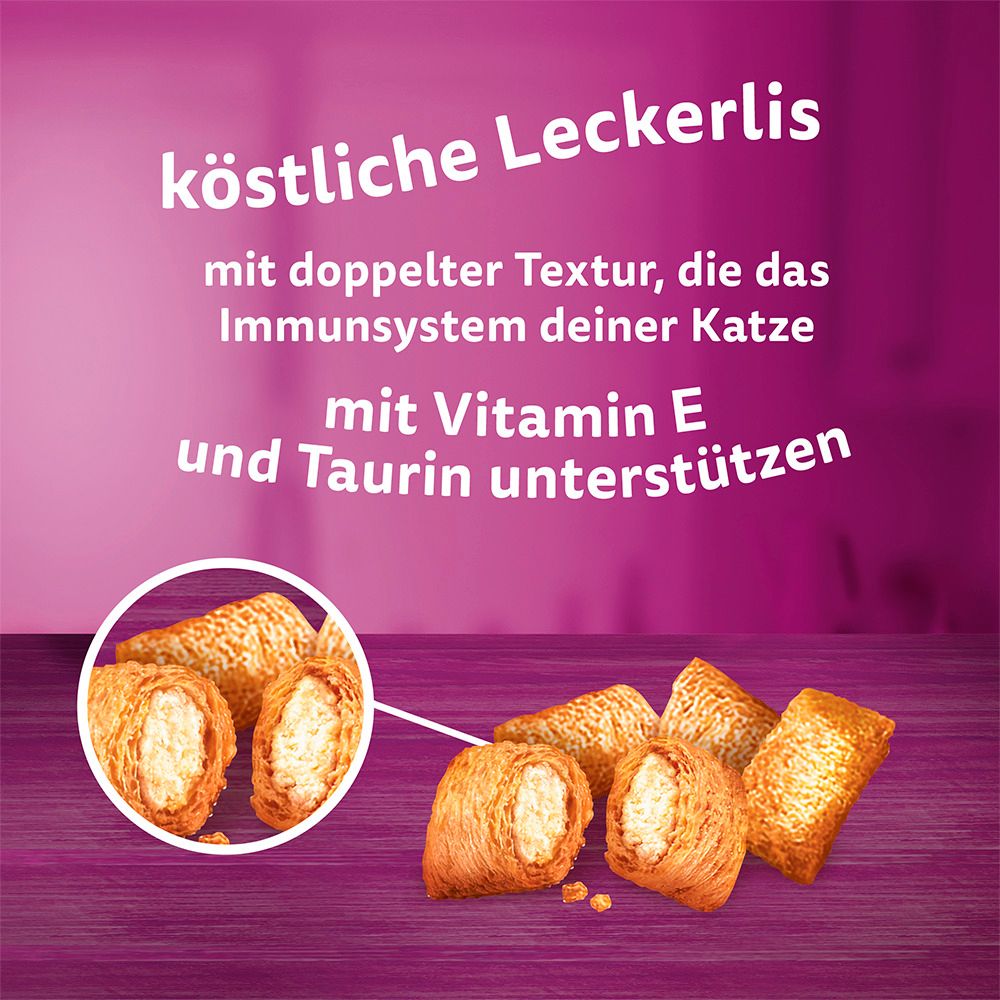 Nahaufnahme von Whiskas Vitamin E-xtra Leckerlis mit Huhn, doppelte Textur.