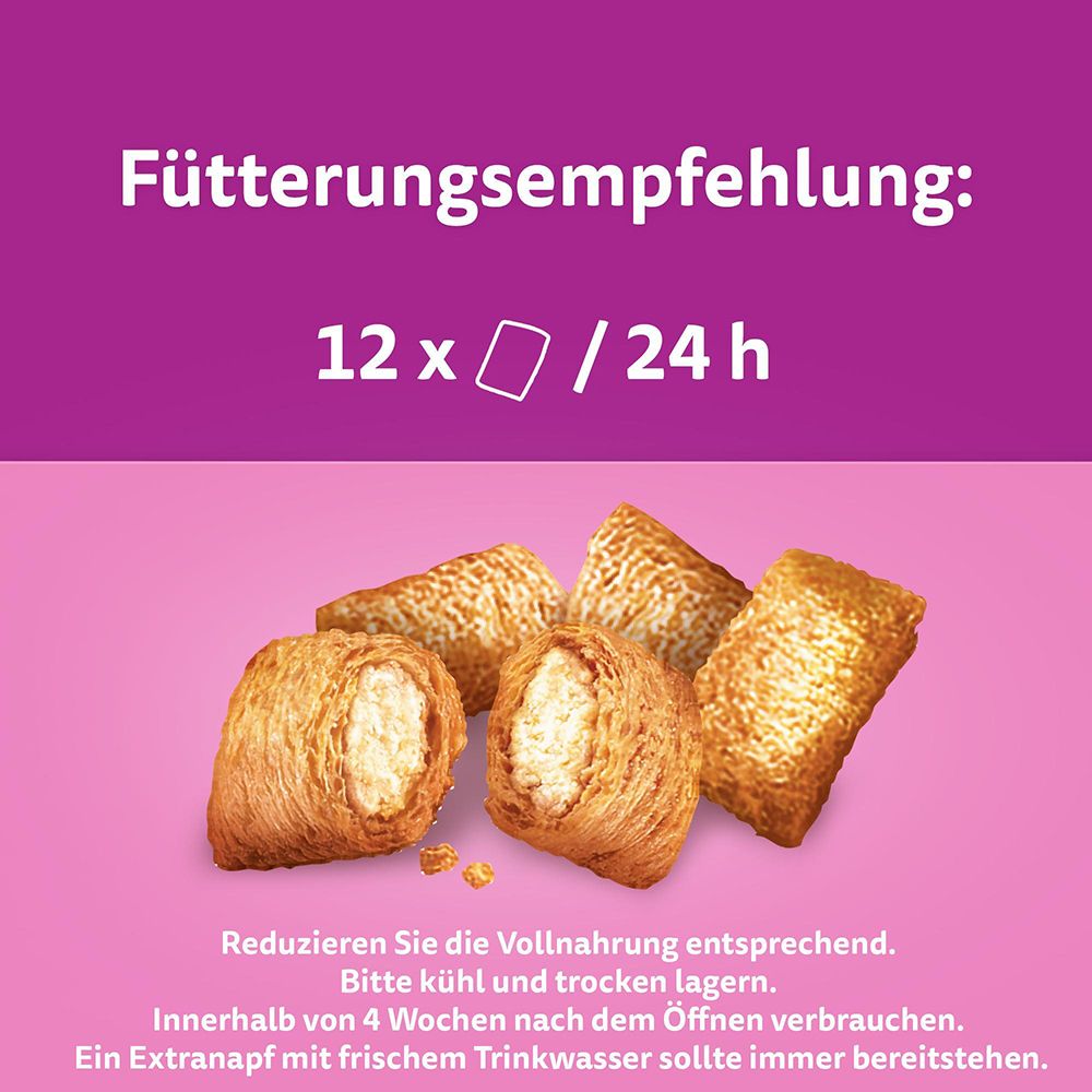 Fünf Whiskas Anti-Hairball Leckerlis mit cremigem Kern.