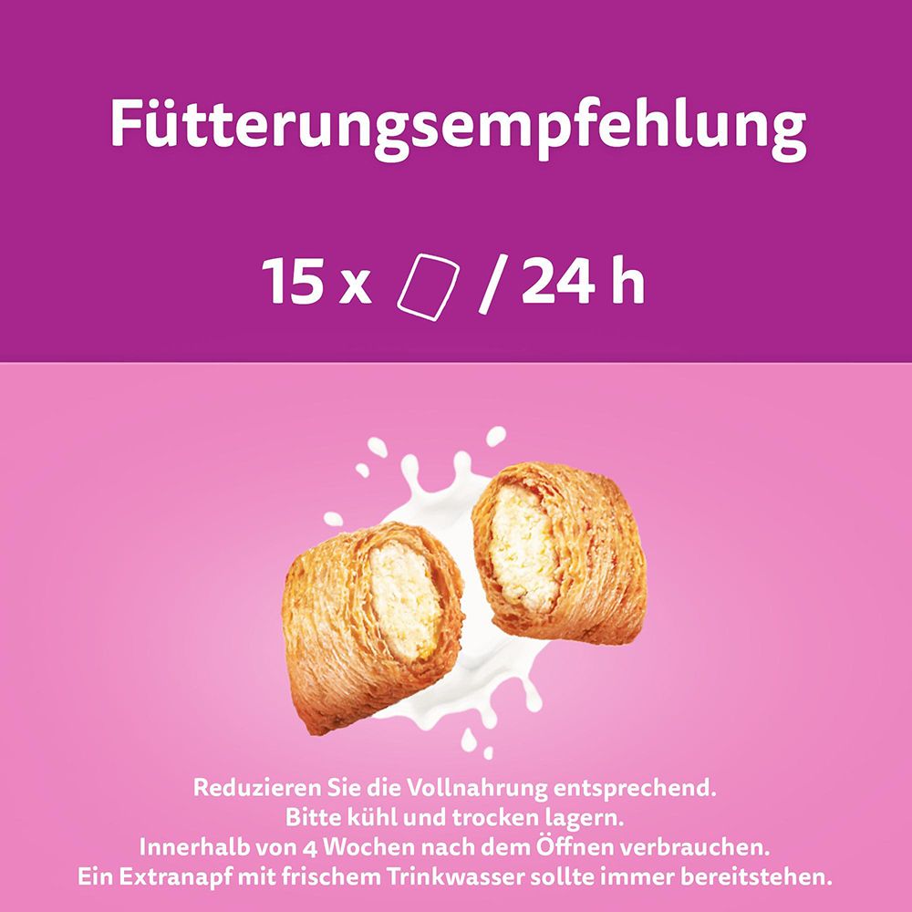 Whiskas Milch-Kätzchen Junior Huhn Snack: Zwei Snacks mit Milchfüllung und Spritzern.