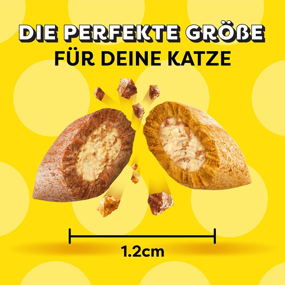 Dreamies: Perfekte Größe für Katzen, 1.2cm. Zeigt zwei Leckerli-Hälften.