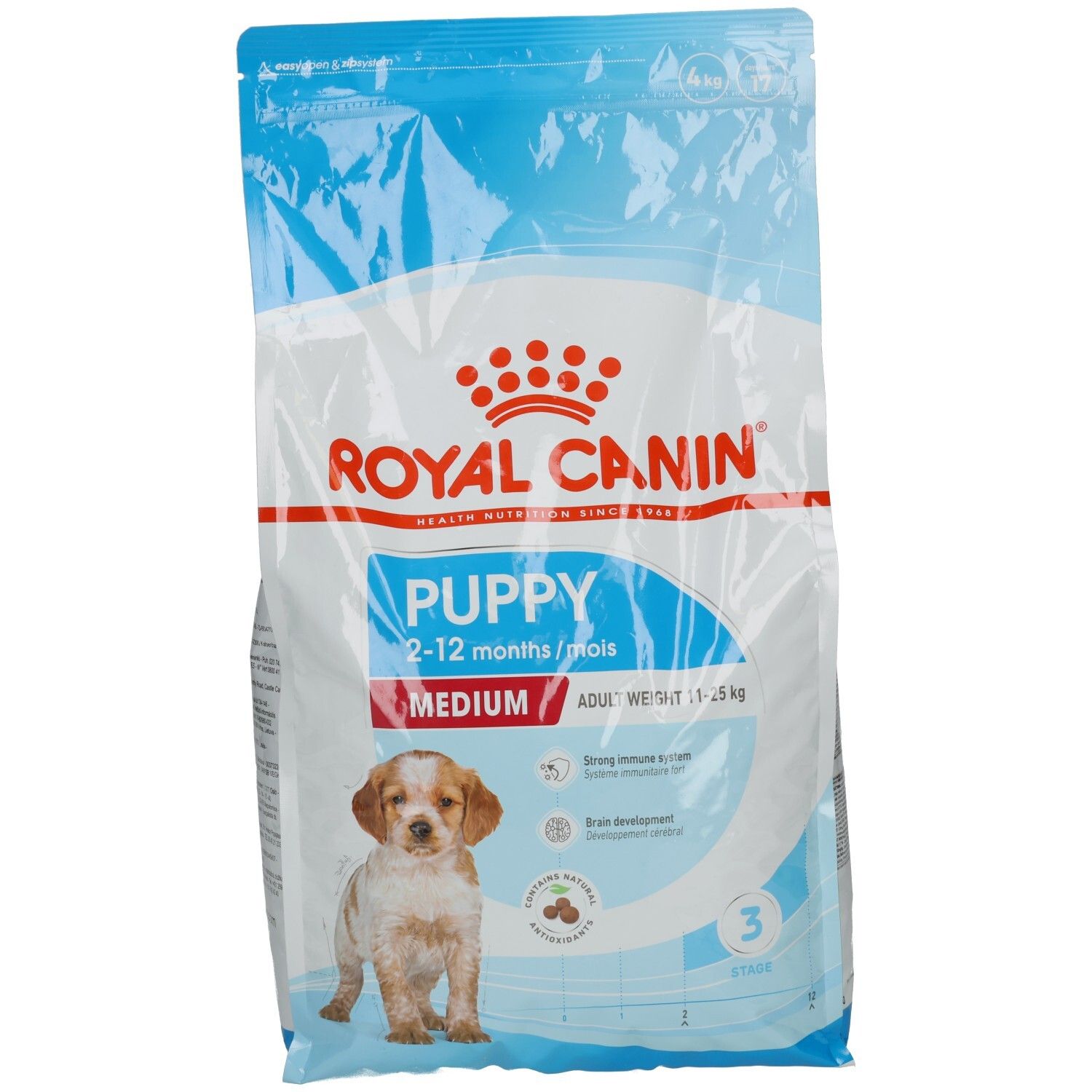 Royal Canin Medium Puppy Futtertüte mit Welpenbild und Produktinformationen.