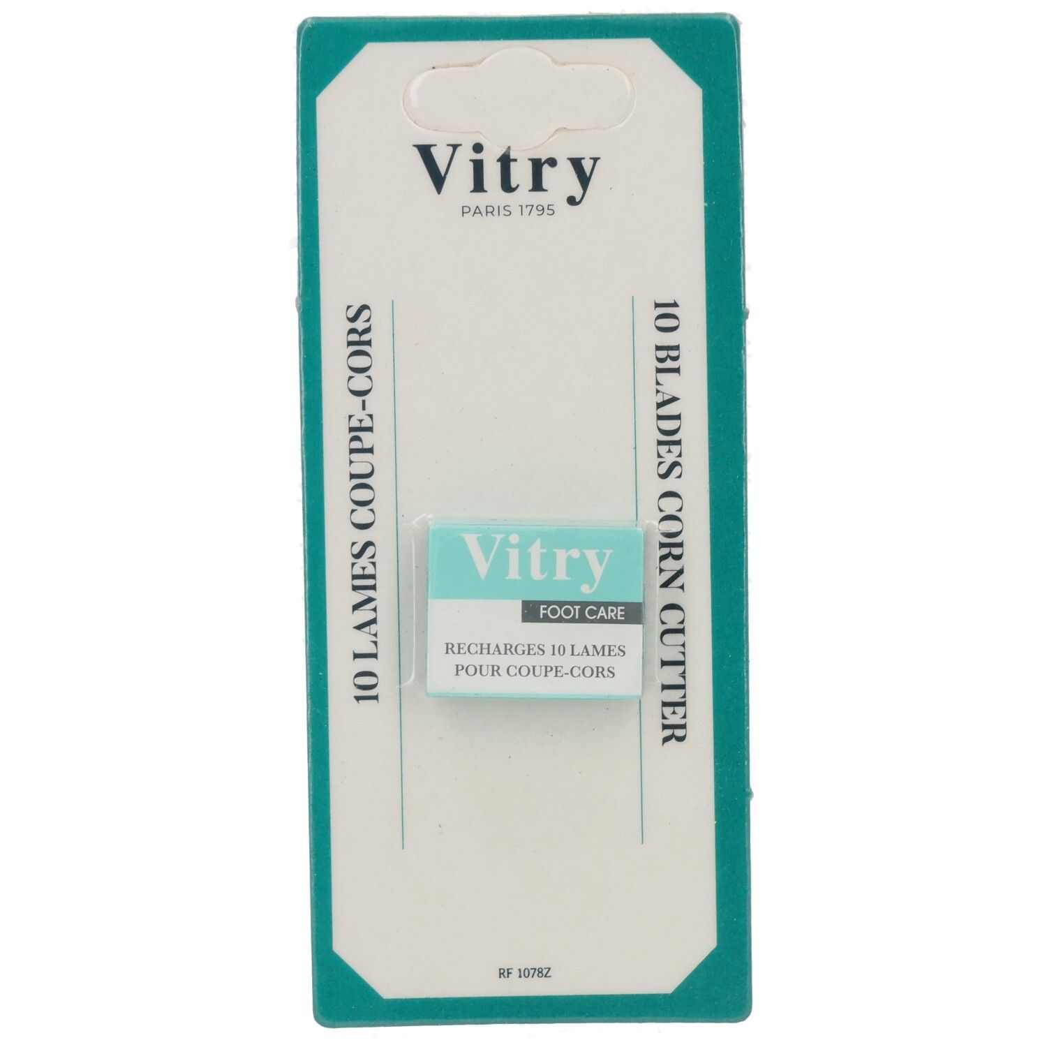 Türkis-weiße Verpackung mit Vitry Fußpflege-Ersatzklingen. Produktname und Text sind deutlich sichtbar.