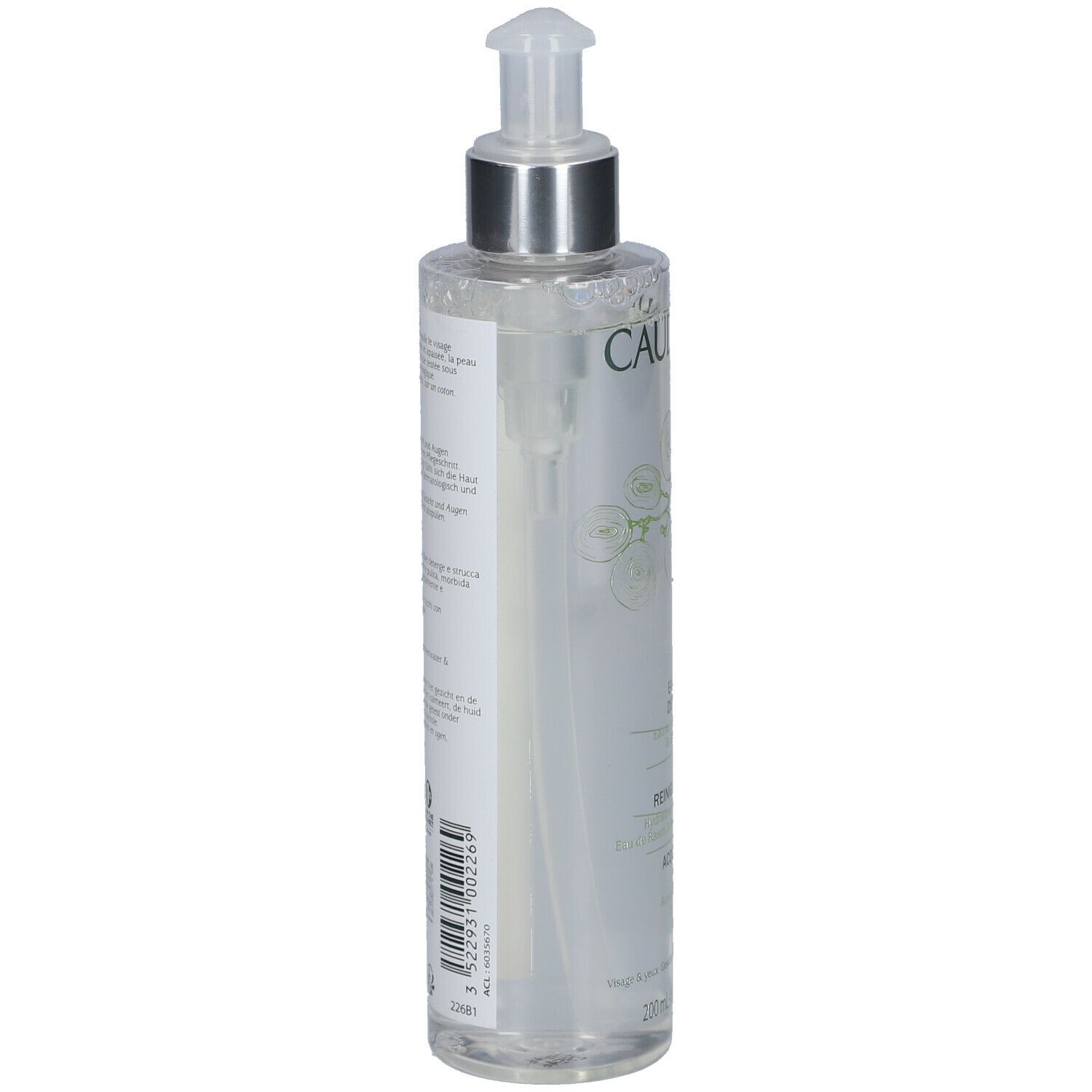 Transparente Flasche mit Pumpe. Aufschrift CAUDALIE. Etikett mit Produktinformationen. Flasche steht leicht schräg.