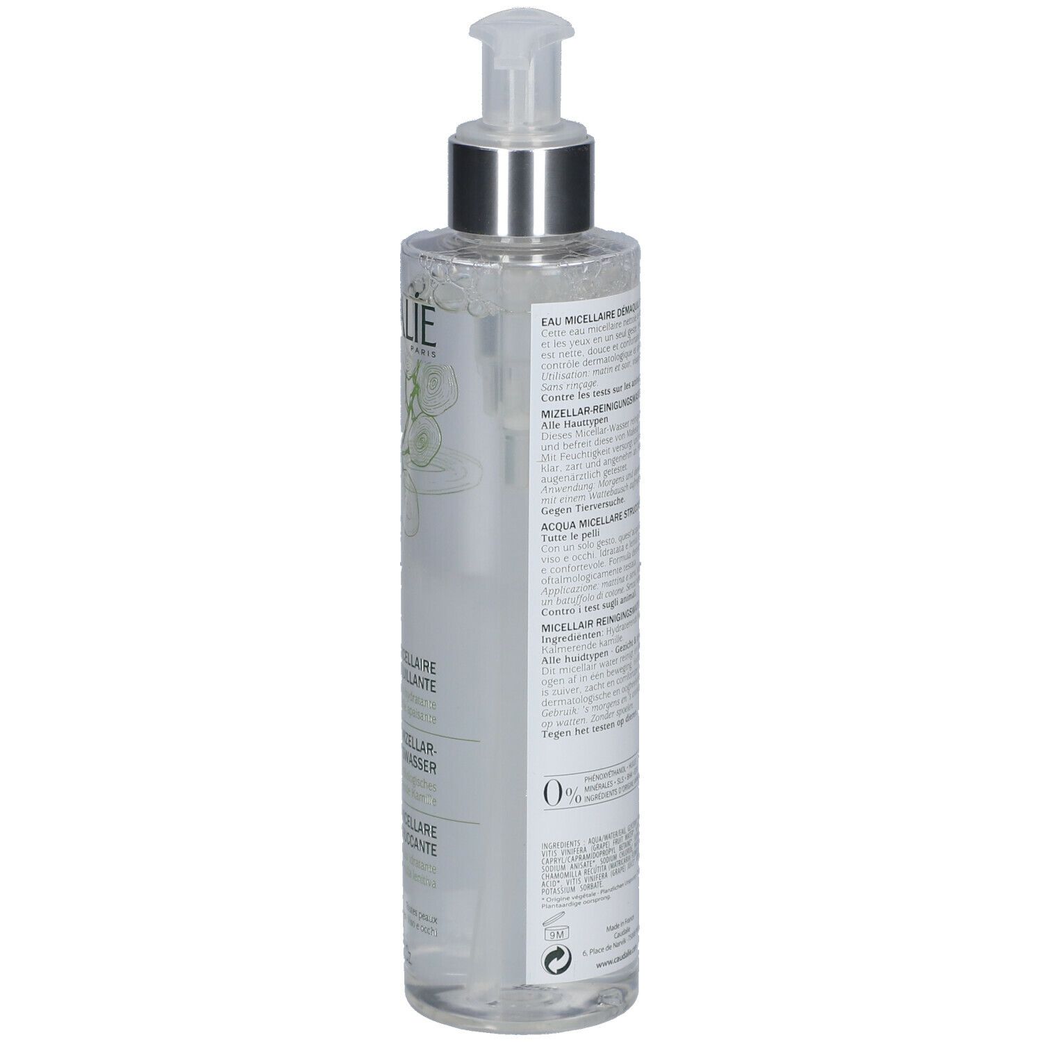 Transparente Flasche mit Pumpe. Aufschrift CAUDALIE. Etikett mit Produktinformationen. Flasche steht leicht schräg.