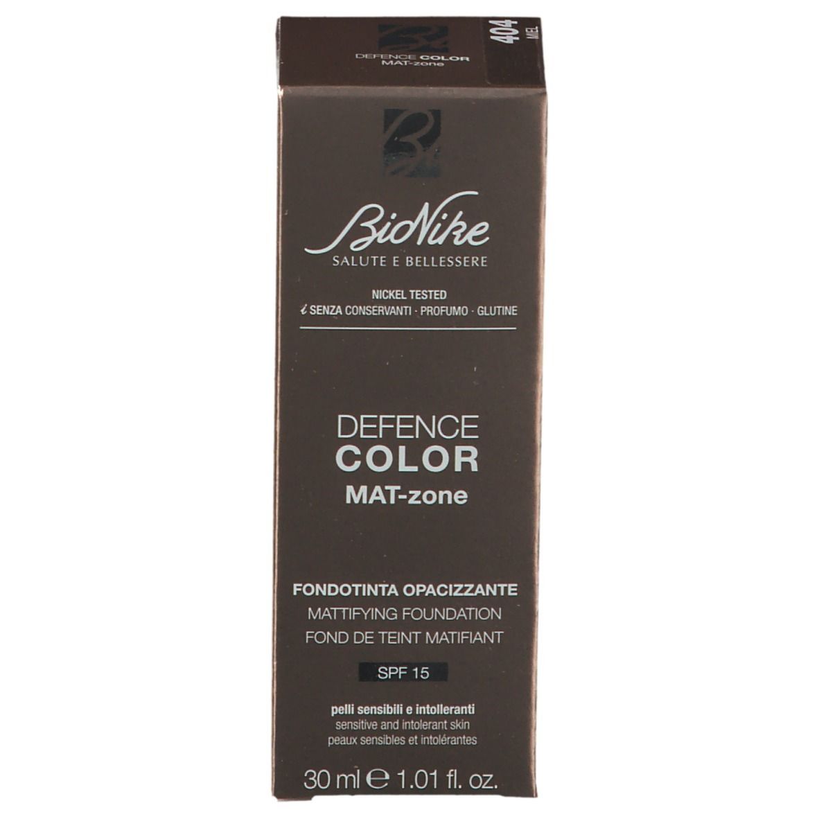 BioNike DEFENCE COLOR MAT-zone Foundation-Verpackung. Braune Schachtel mit Produktinformationen und Logo.