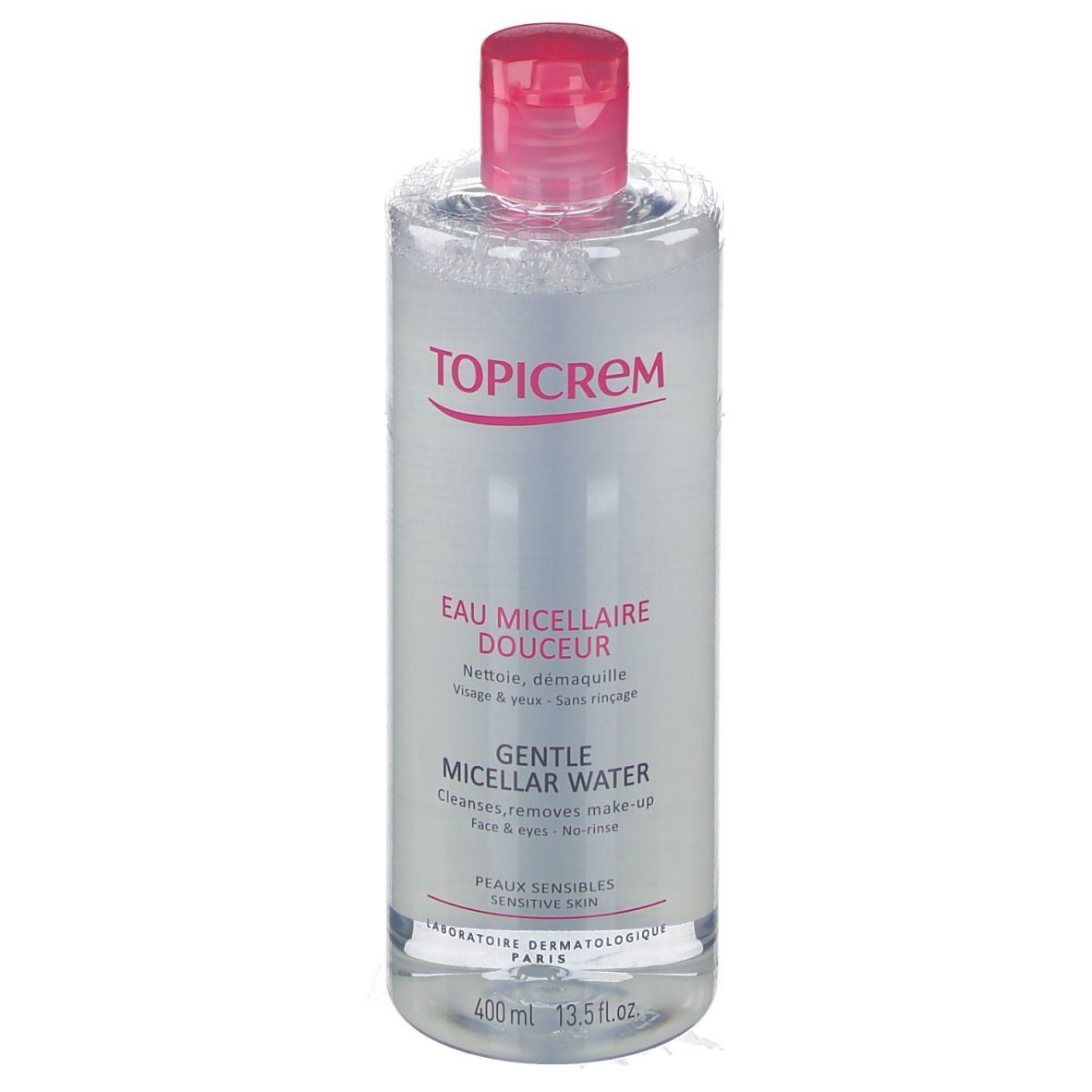 Klare Flasche mit rosa Deckel. Aufschrift TOPICREM, Eau Micellaire Douceur, Gentle Micellar Water. Für empfindliche Haut.