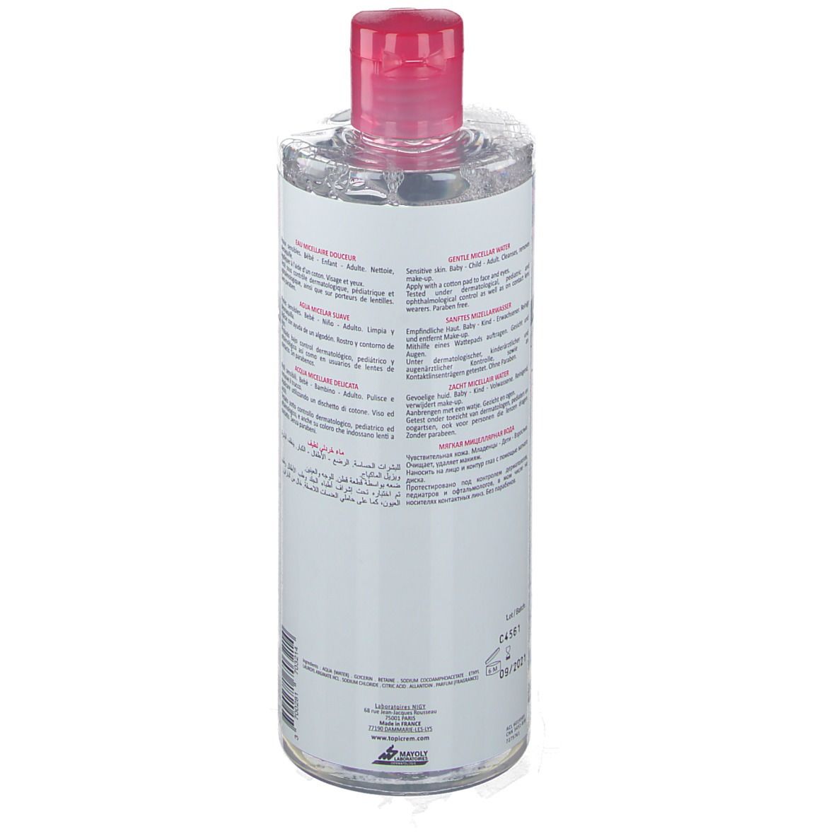 Transparente Flasche mit rosa Deckel. Etikett mit Text in mehreren Sprachen. Produkt für empfindliche Haut.