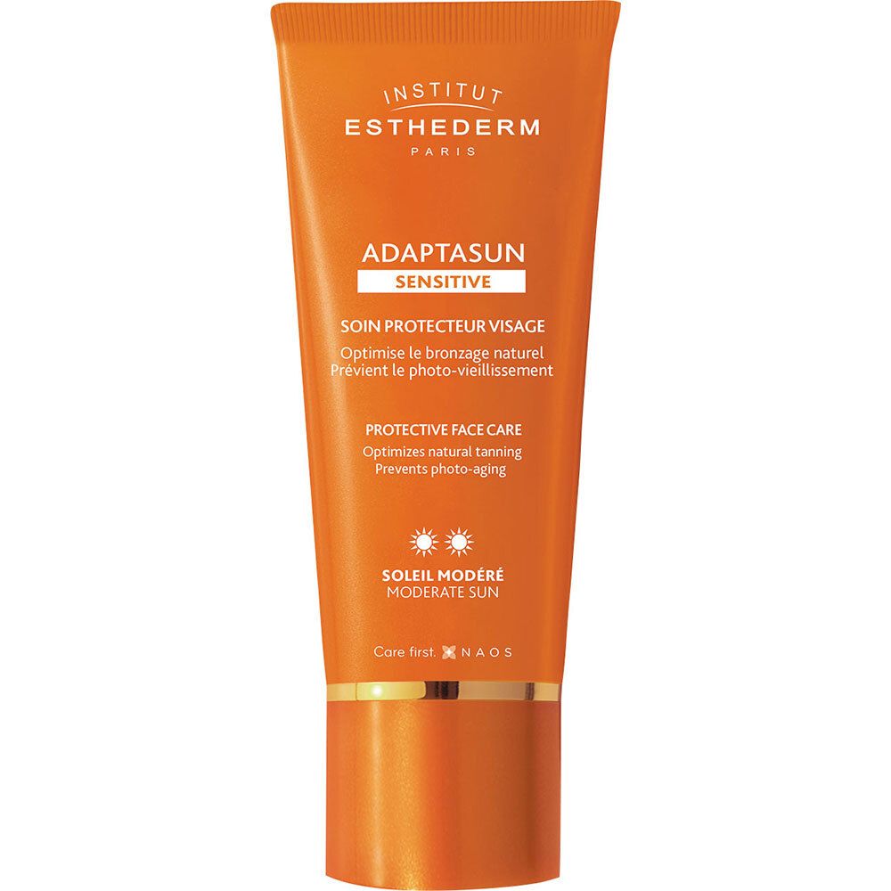Orange Tube mit Sonnencreme. Schriftzug: Adaptasun Sensitive, Protective Face Care. Marke: Institut Esthederm.